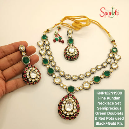 Fine Kundan Necklace Set embellished with semiprecious Green Doublets & Red Pota stones