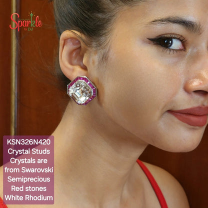 Ear studs with crystals from swarovski bordered with semiprecious red stones