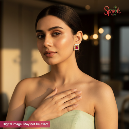 Woman wearing earrings with a blurred background and 'Sparklebydj' brand logo.