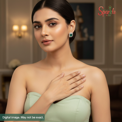 Woman wearing a light green dress with a blurred background, featuring the brand 'Sparklebydj'.