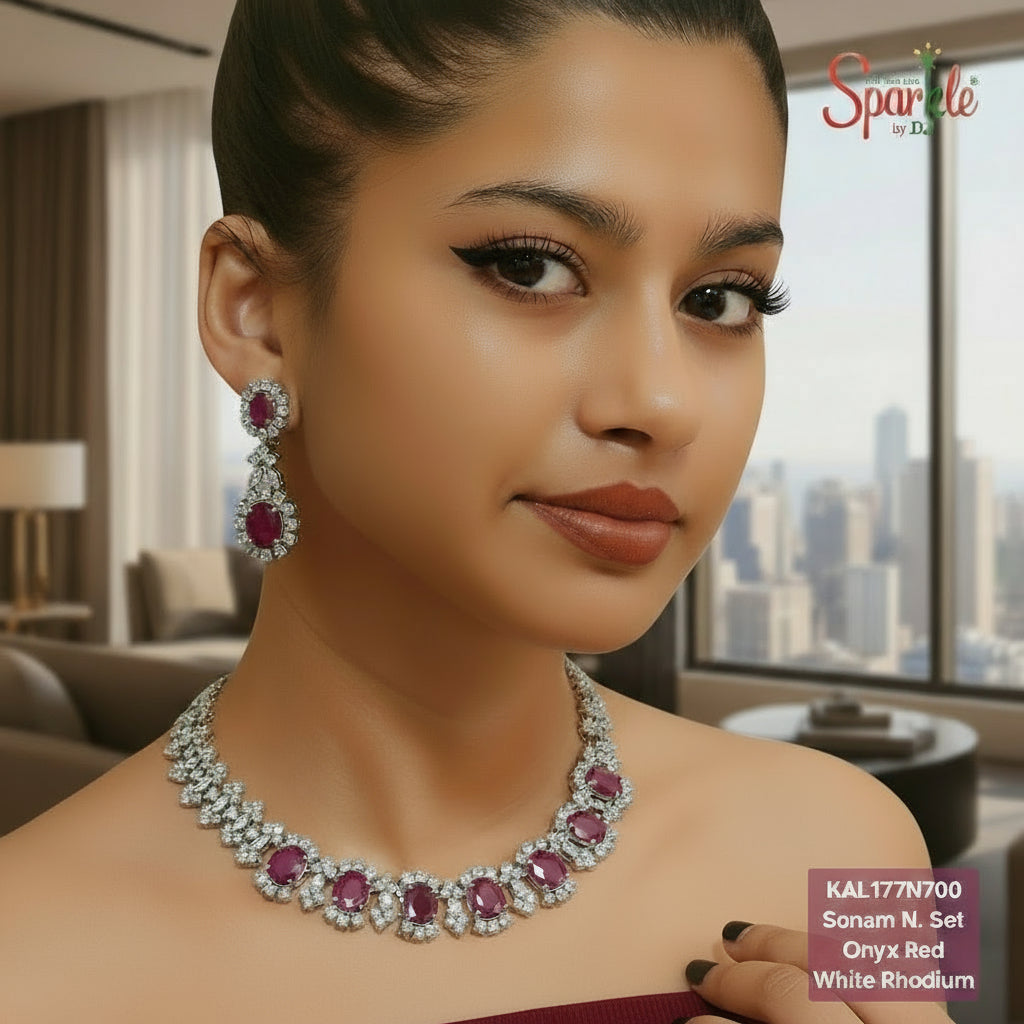 Woman wearing a necklace and earrings with 'SparkleBYDJ' branding