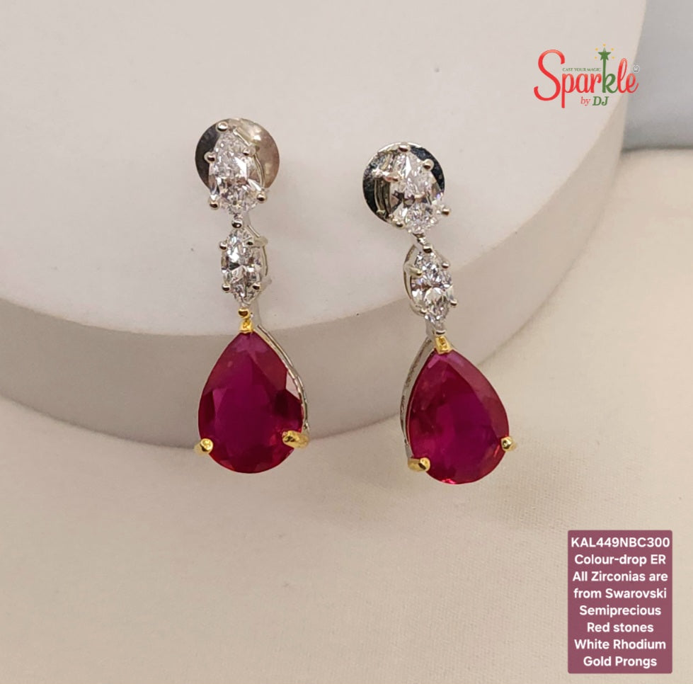 Earrings embellished with original Austrian cz from swarovski setted with pear shaped Semiprecious pear drop