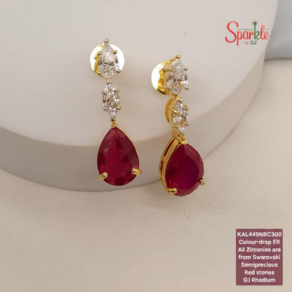 Earrings embellished with original Austrian cz from swarovski setted with pear shaped Semiprecious pear drop