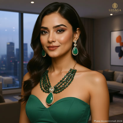Woman wearing green jewelry SET on a white background