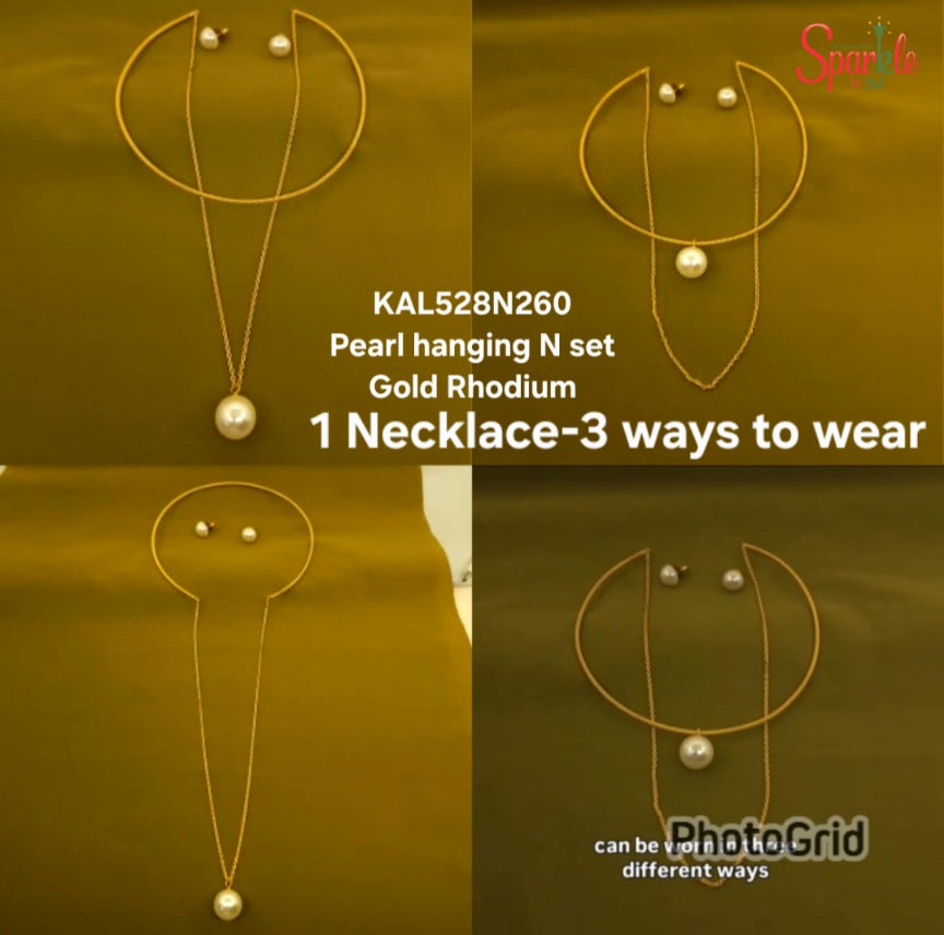 A four-panel collage showing a gold rhodium necklace with a pearl pendant in three styling configurations, plus matching pearl stud earrings. The panels are arranged in a 2x2 grid on a dark olive background, with text reading 'KAL528N260 Pearl hanging N set Gold Rhodium 1 Necklace-3 ways to wear' and a 'SpaDe' logo in the top right.