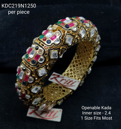 Openable Navratan Kada (bracelet) embellished with semiprecious stones and Fine Kundan.