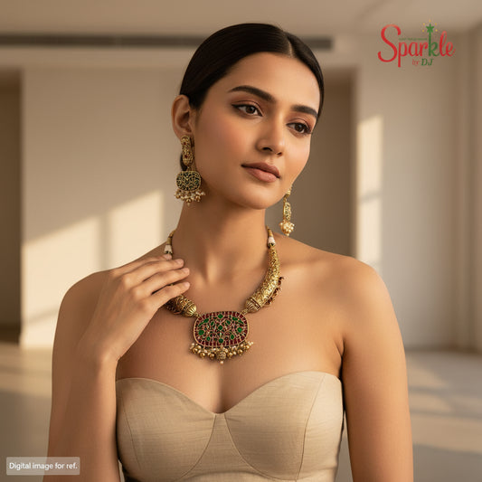 Gold jewelry set with green and red stones on a beige background, branded 'SparklebyDJ'.