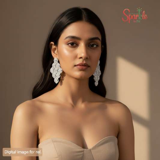 Woman wearing large diamond earrings with a neutral background and 'Sparkle' brand logo.