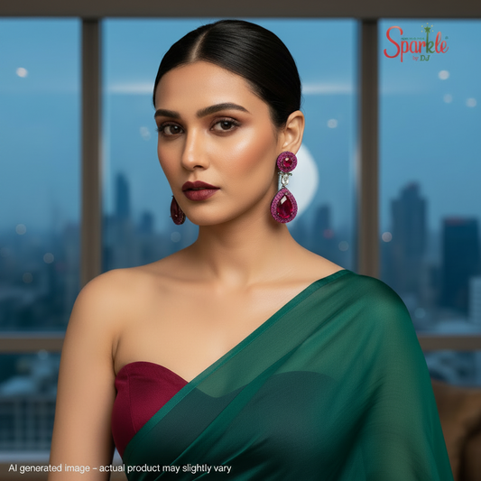 Woman wearing a green and maroon saree with pink earrings against a cityscape background