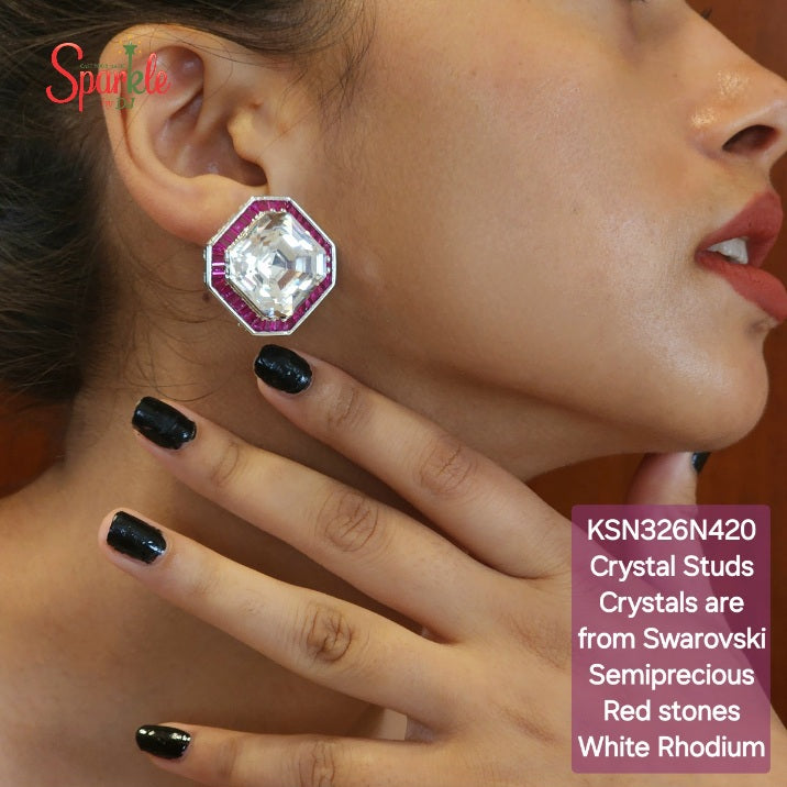 Ear studs with crystals from swarovski bordered with semiprecious red stones