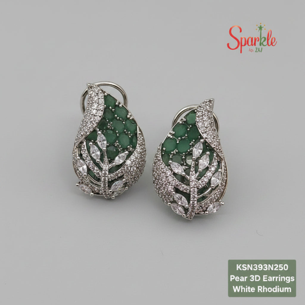 Pear 3D green earrings with green gemstones and white rhodium on a beige surface, branded 'SparklebyDJ'.