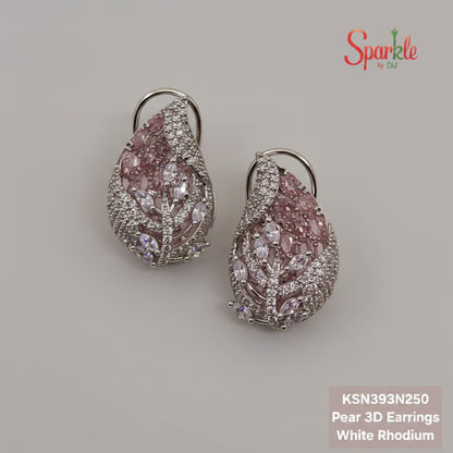 Pear-shaped pink earrings with pink gemstones and white rhodium on a beige surface, branded 'SparklebyDJ'.