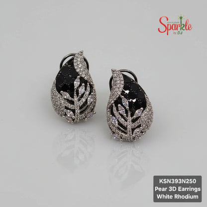 Pear 3D black earrings with black and silver design on a beige background, branded 'SparklebyDJ'.