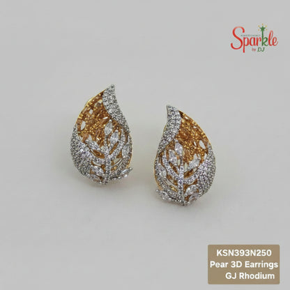 Pear-shaped Champaigne 3D earrings with white rhodium finish on a beige background, branded 'SparklebyDJ'.