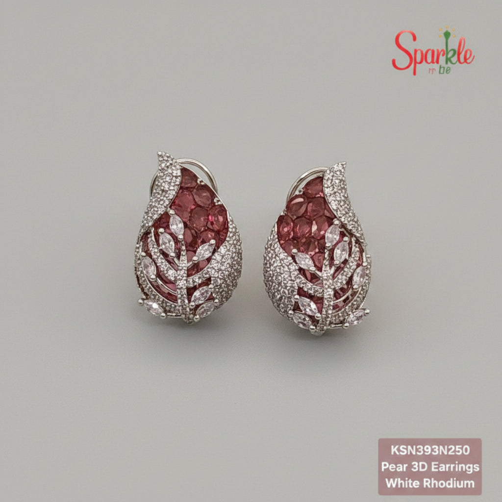 Pair of pear-shaped earrings with pink gemstones and white rhodium plating on a beige surface.