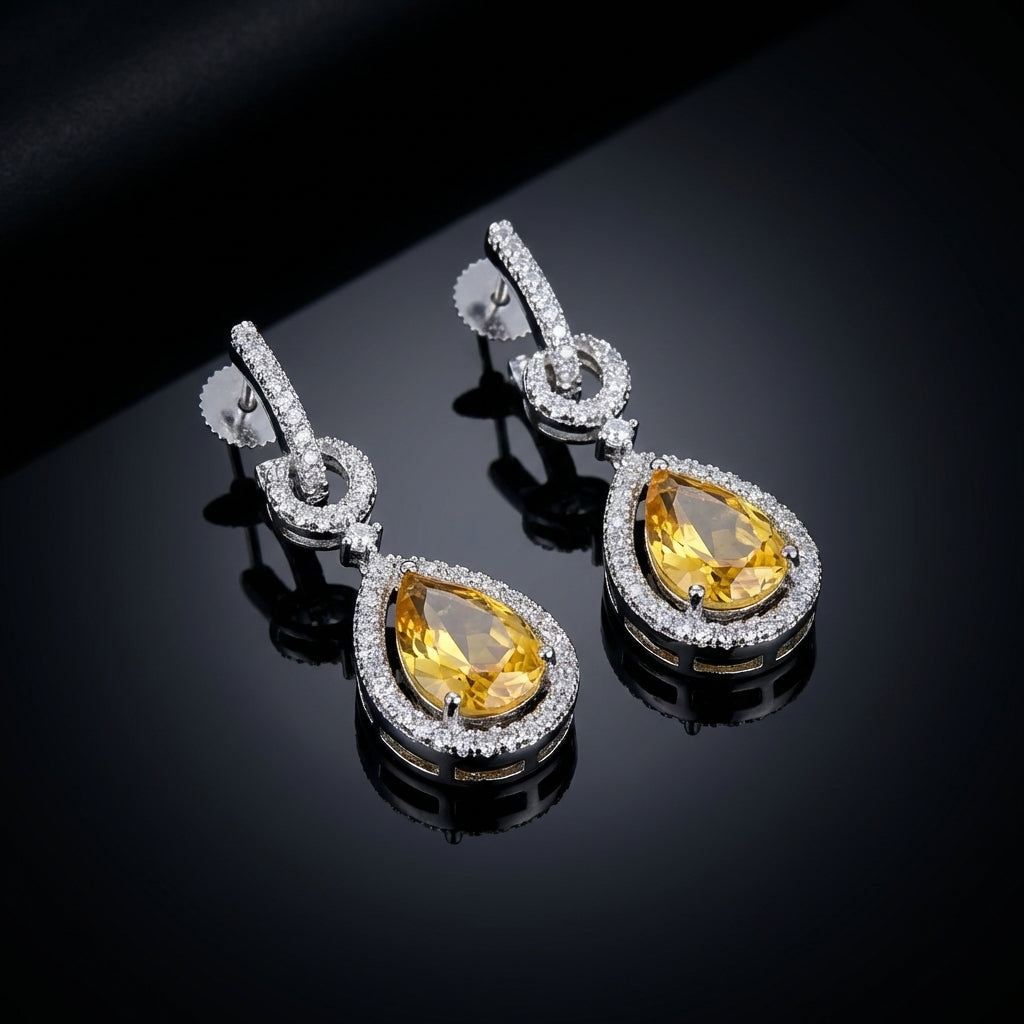 Artistic still life of a tiny CZ drop earring on reflective black background, close-up of halo and micro details, luxurious and sophisticated.