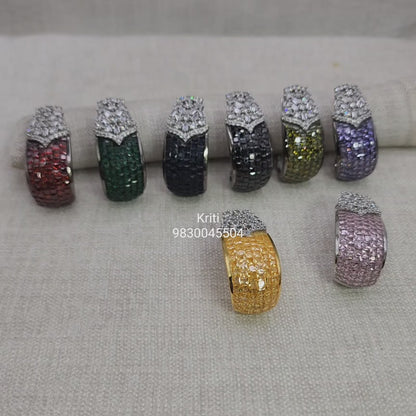 Cubic zirconia Balis embellished with semiprecious stones in Invisible Setting